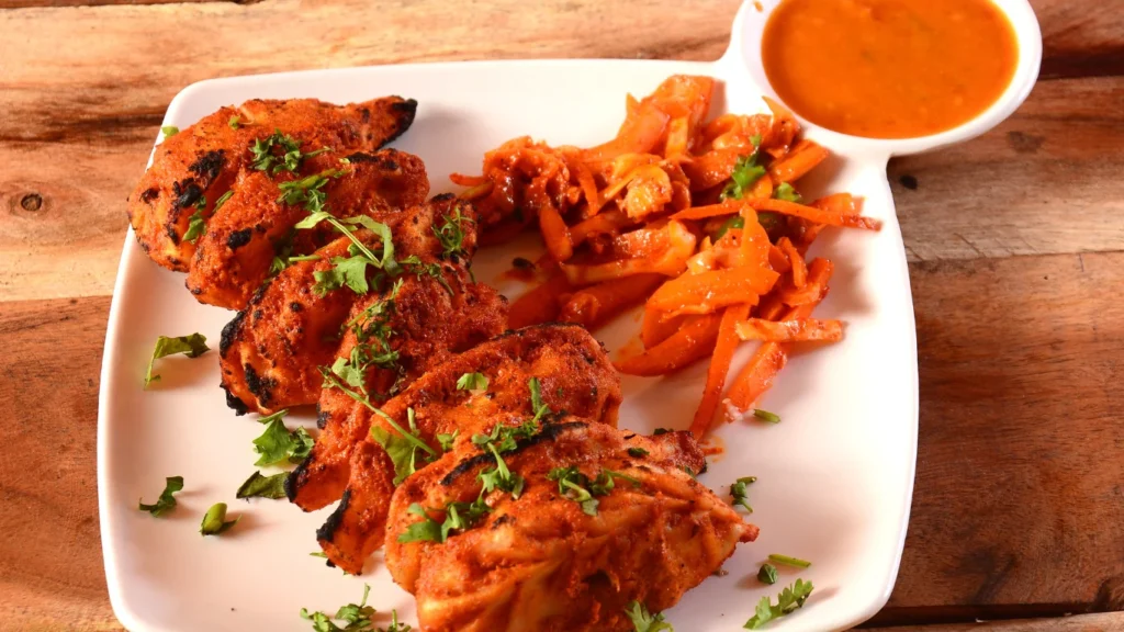  7. Chicken Tandoori – Smoky Flavour That Attracts Customers Instantly